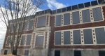 The former Broadview School is a two storey red brick building with a flat roof and limestone details. The building is located in the Highland Park neighbourhood.