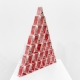 Triangular scuplture made from aluminum plates that resemble traditional red and white playing cards