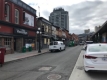 Photo offrant une vue de la rue sur les bâtiments endommagés par un incendie aux 35-43 ½, rue William