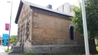 The City Registry Office at 70 Nicholas Street is a buff brick building with stone details.