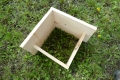 A basic wooden box to hold the nesting materials..