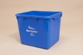 A blue curbside recycling container